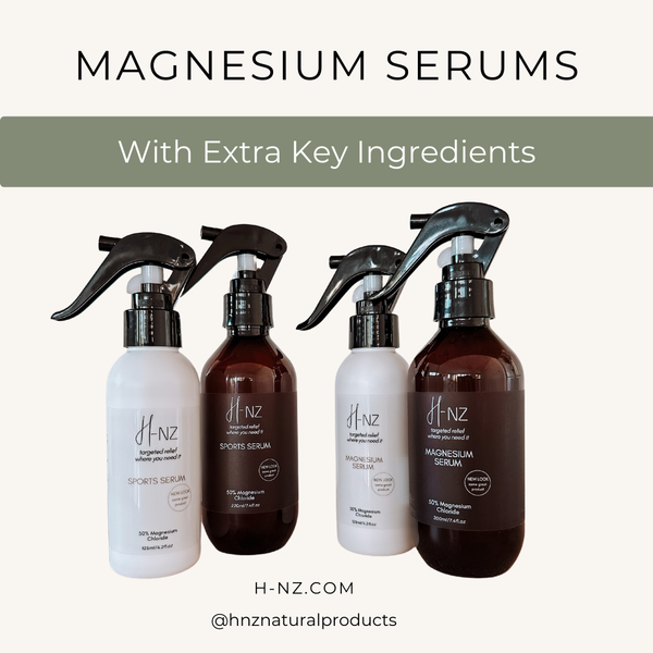 Four bottles of H-N-Z magnesium serums on a white background with text about extra key ingredients.